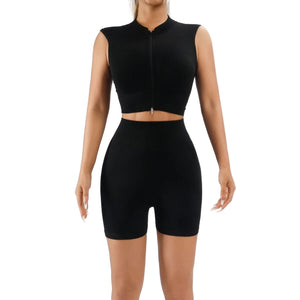Women's 2-piece workout set with high-waisted tummy control shorts and sleeveless sports tank in multiple colors