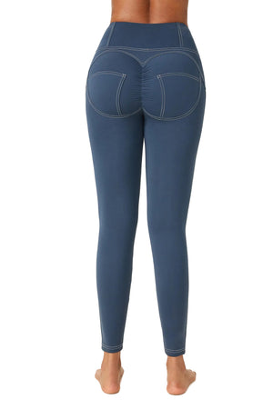 Pleated high waist sports leggings with vibrant all-over print in grey, blue, and green colors