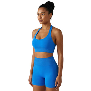Women's halter sports bra and shorts set in multiple colors