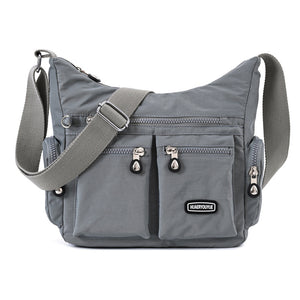 Waterproof nylon women's crossbody shoulder bag in various colors with multiple pockets