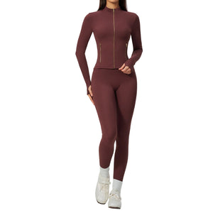Womens figure-hugging workout two-piece set in various colors showing long sleeve top and mid-rise trousers