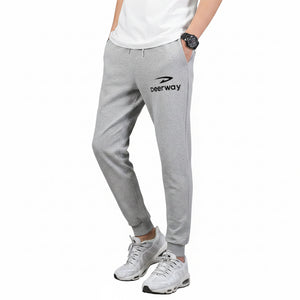 Men's loose fit cotton sweatpants with elastic waistband in various colors