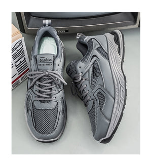 Men's breathable mesh athletic dad shoes in black and gray with thick rubber sole