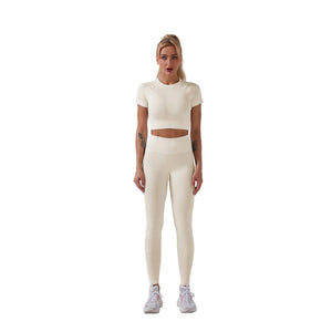 Seamless women's fitness yoga set in multiple colors including grey, pink, and blue