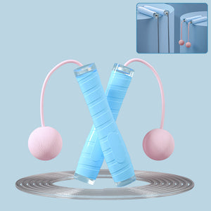 Dual purpose skipping rope with cordless ball in pink, black, and blue colors