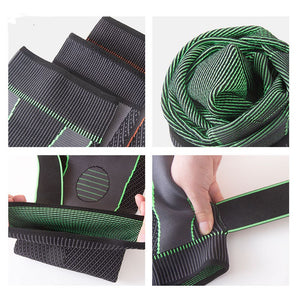 Long straps knee pads in green and black colors showing non-slip sports protection design