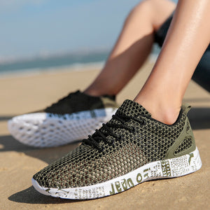 Breathable mesh men's casual sneakers in black, grey, and dark green