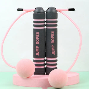 Cordless skipping rope with stainless steel double bearings and EVA sponge ball handles in pink and blue colors