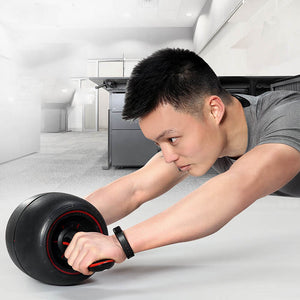 Home abdomen recuperation and fitness wheel in black and red colors
