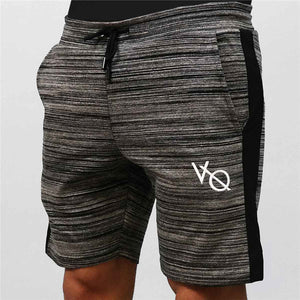 Men's quick-dry fitness shorts in grey and black available in multiple sizes
