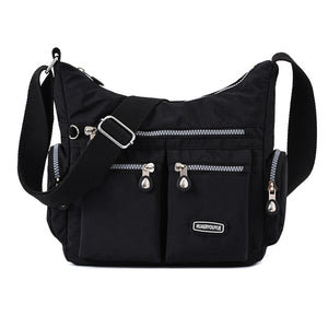 Waterproof nylon women's crossbody shoulder bag in various colors with multiple pockets