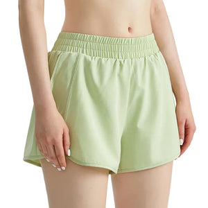 Women's fake two-piece athletic shorts in various colors for running and yoga