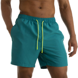 Men's cotton mid-waist beach shorts in assorted solid colors