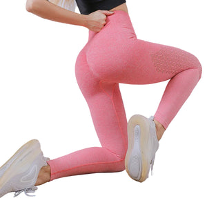 Seamless women's yoga pants in various colors for fitness and gym workouts
