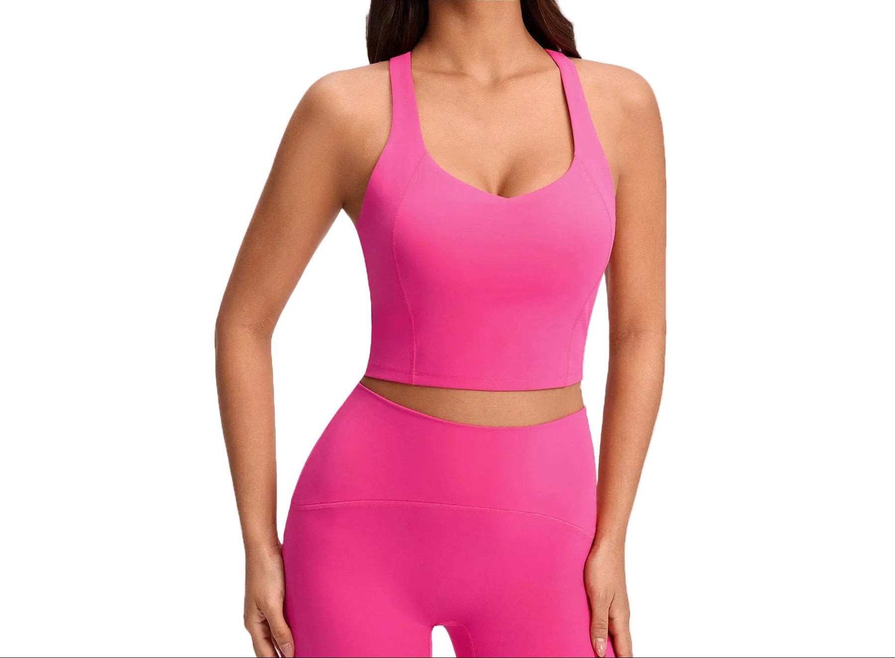 Women's push-up sports bra with breast pads in pink, white, and black colors