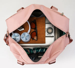 Foldable travel duffel bag in multiple colors with shoe storage and multiple pockets