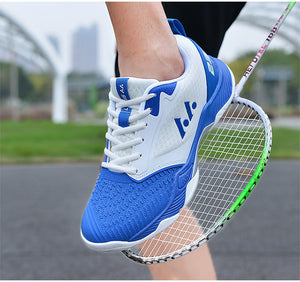 Men's mesh volleyball training shoes in white with blue, red, and black accents