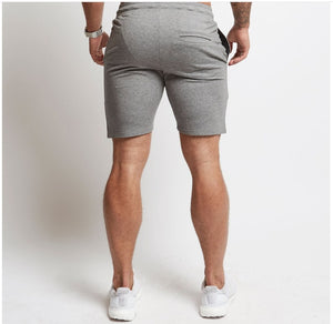 Men's cotton athletic five-point shorts in black, gray, and khaki colors