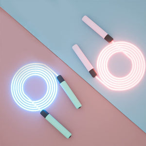 Luminous LED jump rope with comfortable handles in green, pink, and blue colors