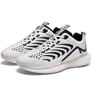Glow-in-the-dark men's trainers in green, black, white, and red with mesh vamp and TPU sole