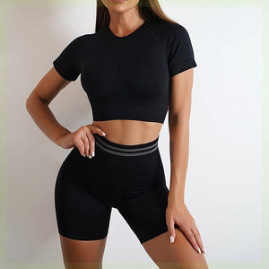 Seamless women's sports set with long-sleeve top and yoga pants in various colors