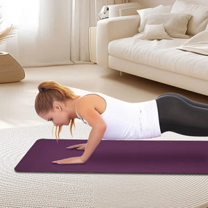 Purple non-slip TPE yoga mat measuring 72 by 24 inches for fitness and Pilates