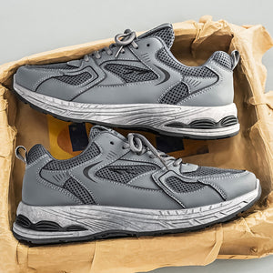 Men's breathable mesh athletic dad shoes in black and gray with thick rubber sole