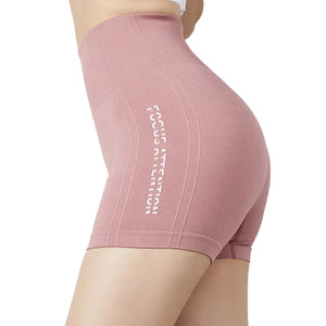 Women's tight fitting fitness yoga shorts in army green, sand pink, twilight blue, and mysterious black