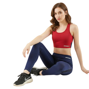 Women's sports running leggings in red, black, and blue with peach-lifting contour