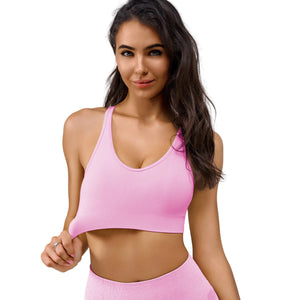 Women's medium-high support sports bra in various colors with push-up design