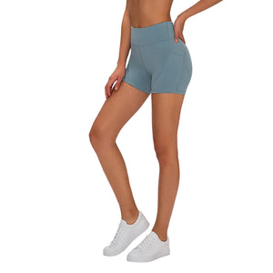 Women's high waisted athletic fitness shorts with two side pockets in various colors