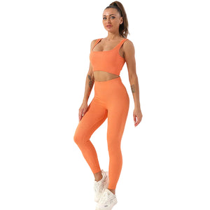 Seamless yoga set with high waist leggings and matching bra in various colors