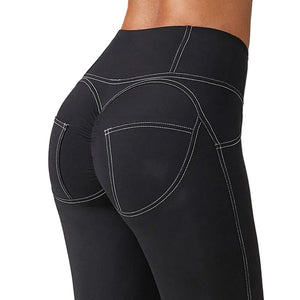Pleated high waist sports leggings with vibrant all-over print in grey, blue, and green colors