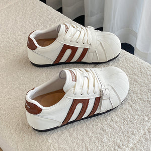 Womens German trainer casual leather sneakers in green with lace-up closure