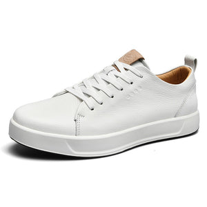 Men's casual leather sneakers in white and black with rubber sole and front lacing
