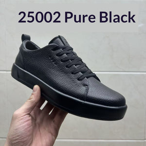 Men's casual leather sneakers in white and black with rubber sole and front lacing