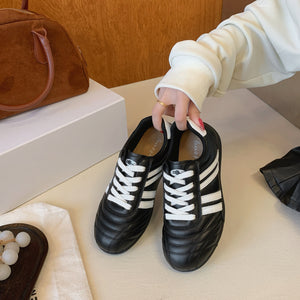 Women's versatile lightweight training sneakers in black, silver, and beige with lace-up closure