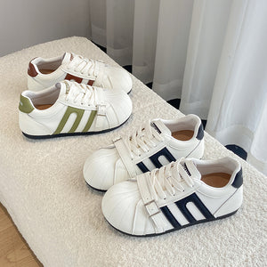 Womens German trainer casual leather sneakers in green with lace-up closure