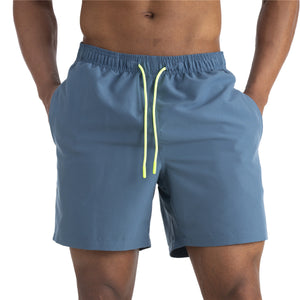 Men's cotton mid-waist beach shorts in assorted solid colors