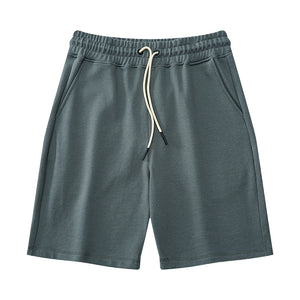 Men's heavy cotton mid-waist shorts in various colors including black, red, and blue