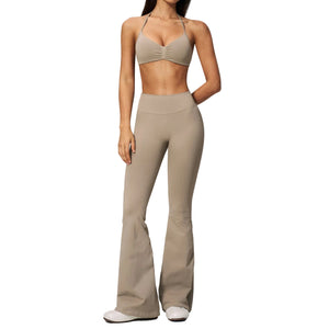 Women's halter top and flared pants activewear set in multiple colors