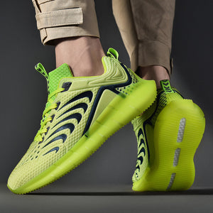 Glow-in-the-dark men's trainers in green, black, white, and red with mesh vamp and TPU sole