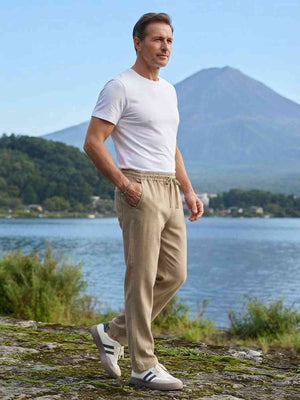 Men's stretch anti-wrinkle casual pants in black shown from multiple angles