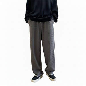Jacquard rhombus patterned men's draped pants in white, gray, and black colors