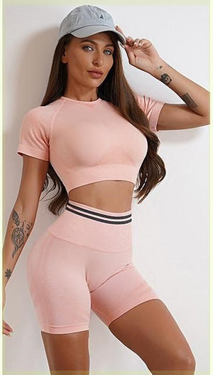 Seamless women's sports set with long-sleeve top and yoga pants in various colors