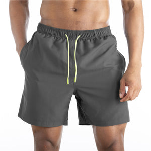 Men's cotton mid-waist beach shorts in assorted solid colors
