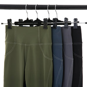 Pleated high waist sports leggings with vibrant all-over print in grey, blue, and green colors