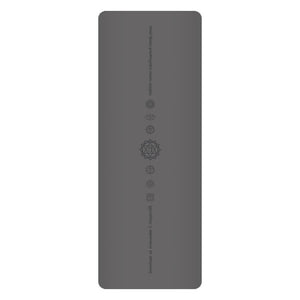 White PU leather yoga mat with natural rubber base rolled out on floor