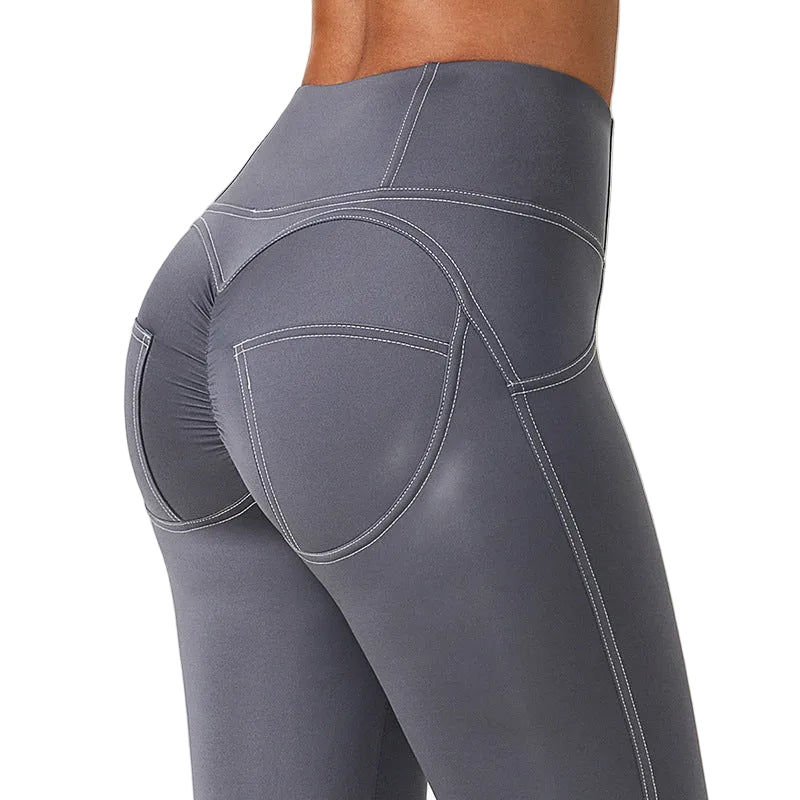 Pleated high waist sports leggings with vibrant all-over print in grey, blue, and green colors