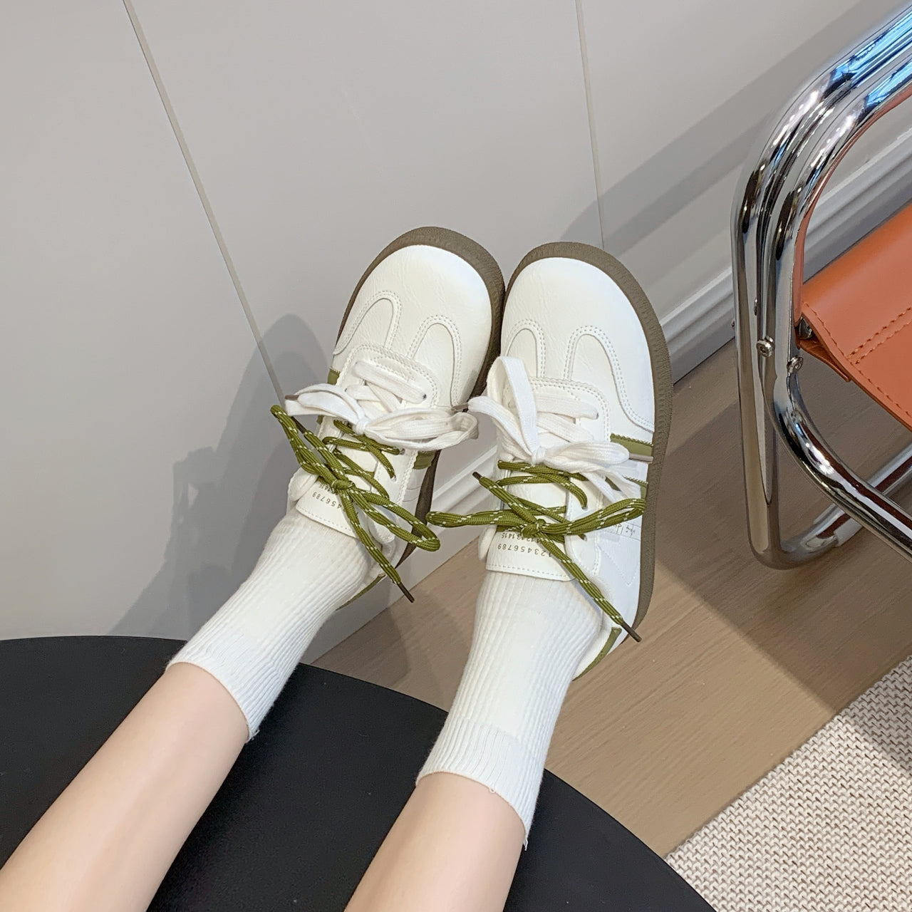 Women's casual leather running sneakers in multiple colors with rubber sole and lace-up closure